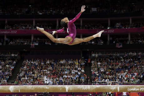 U.S. gymnast Gabrielle Douglas during the artistic gymnastics women's individual all-around competition at the 2012 Summer Olympics, Thursday, Aug. 2, 2012, in London. (AP Photo/Gregory Bull) (Gregory Bull)