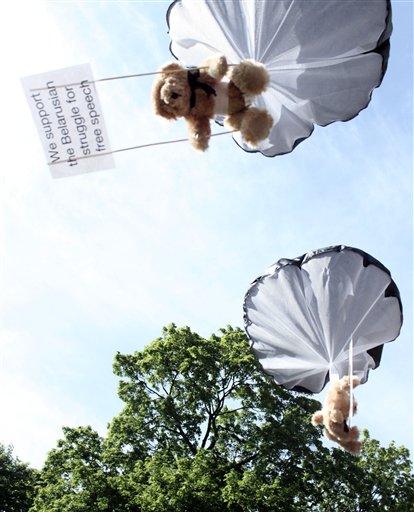 Studio Total teddy bears hang on parachutes during a training in Stockholm, Sweden. (AP/Studio Total/Per Cromwell)