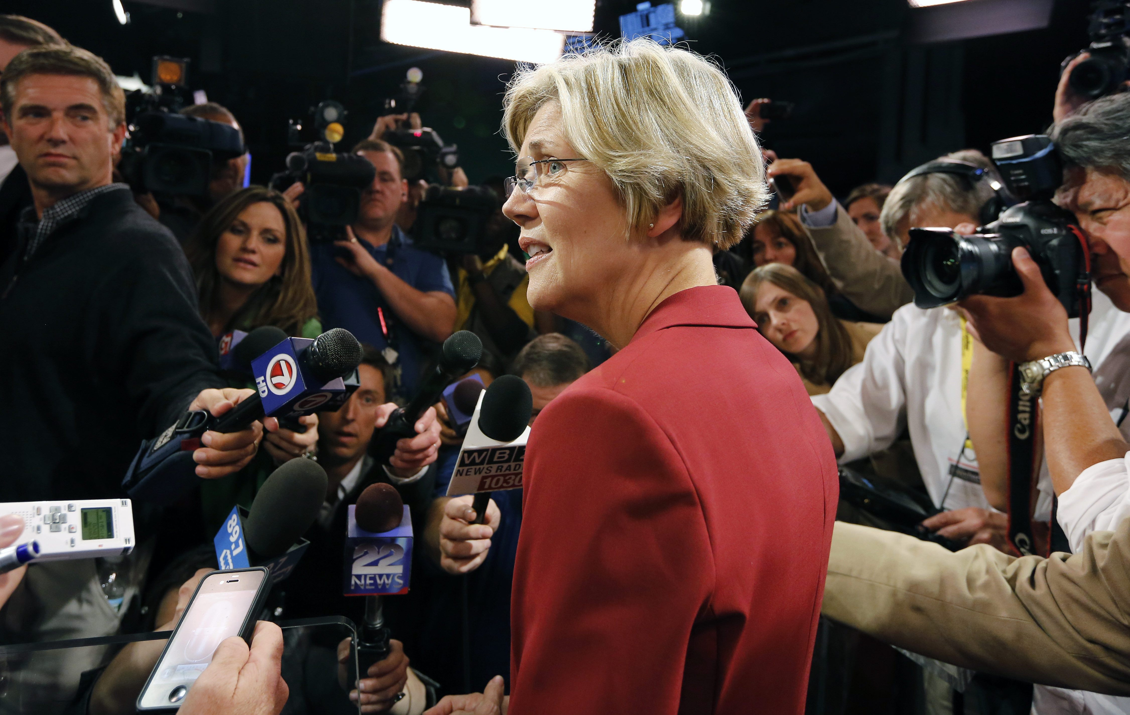 Elizabeth Warren talks with reporters following her debate with Sen. Scott Brown, R-Mass. (AP /Michael Dwyer)
