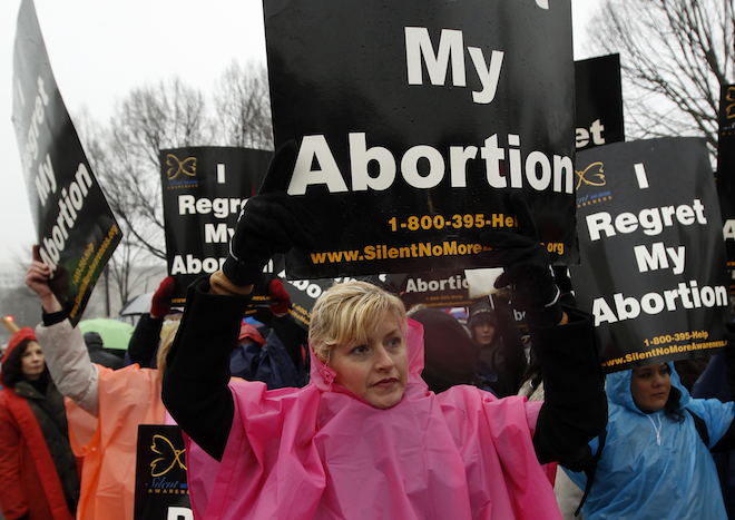 Anti-abortion demonstrators take part in the "March for Life" in Washington January 23, 2012. (Reuters/Kevin Lamarque)