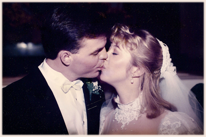 A wedding photo of the author and her husband.