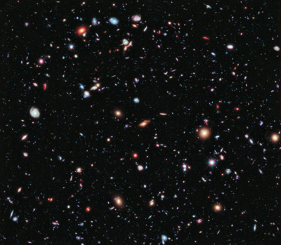 (NASA, ESA, G. Illingworth, D. Magee, and P. Oesch (University of California, Santa Cruz), R. Bouwens (Leiden University), and the HUDF09 Team)