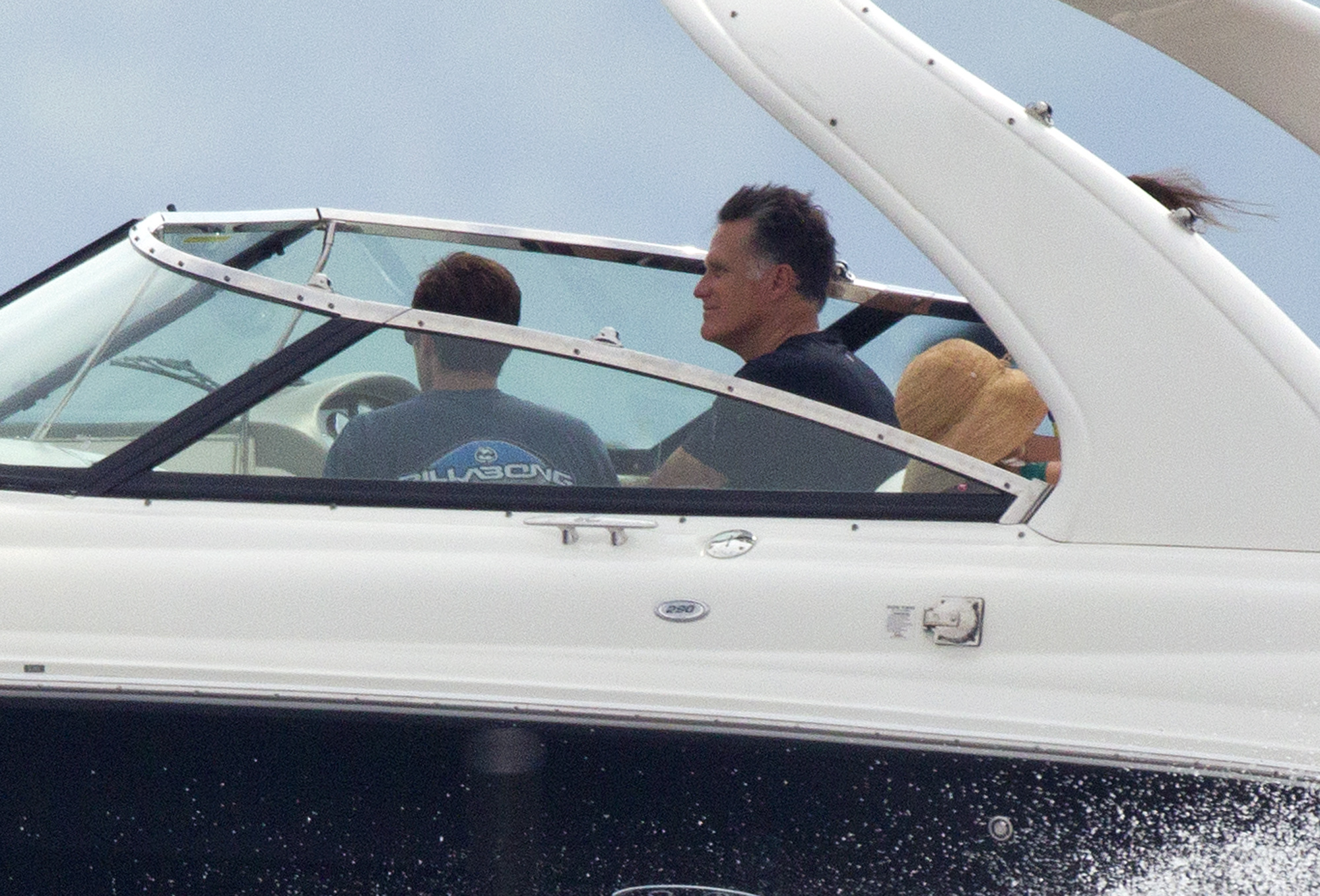 Republican presidential candidate, former Massachusetts Gov. Mitt Romney, takes his family for a boat ride on Lake Winnipesaukee on Saturday, July 14, 2012 in Wolfeboro, NH.  (AP Photo/Evan Vucci) (Associated Press)