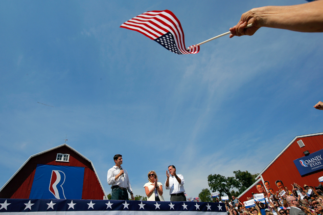 Paul Ryan, Ann Romney and Mitt Romney during a campaign rally in Commerce, Mich., on Aug. 24 (Reuters/Brian Snyder)