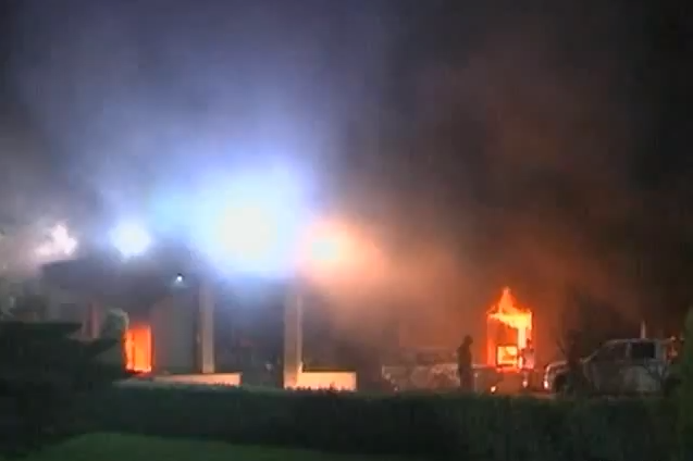 Fire burns in the U.S. consulate in Benghazi after Sept. 11 attack (Wikimedia)