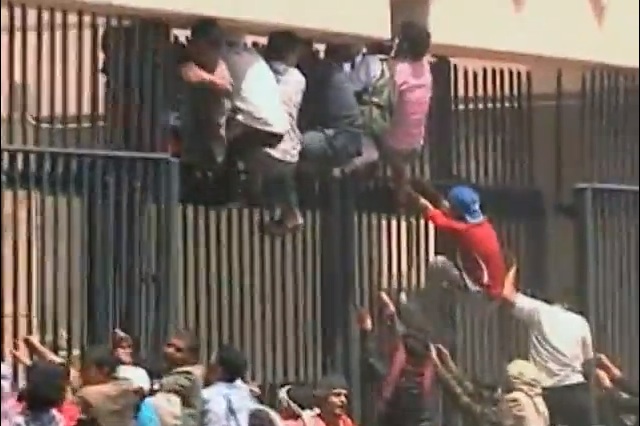 Protesters attempt to breach the U.S. embassy in Sana, Yemen in September (Wikimedia)