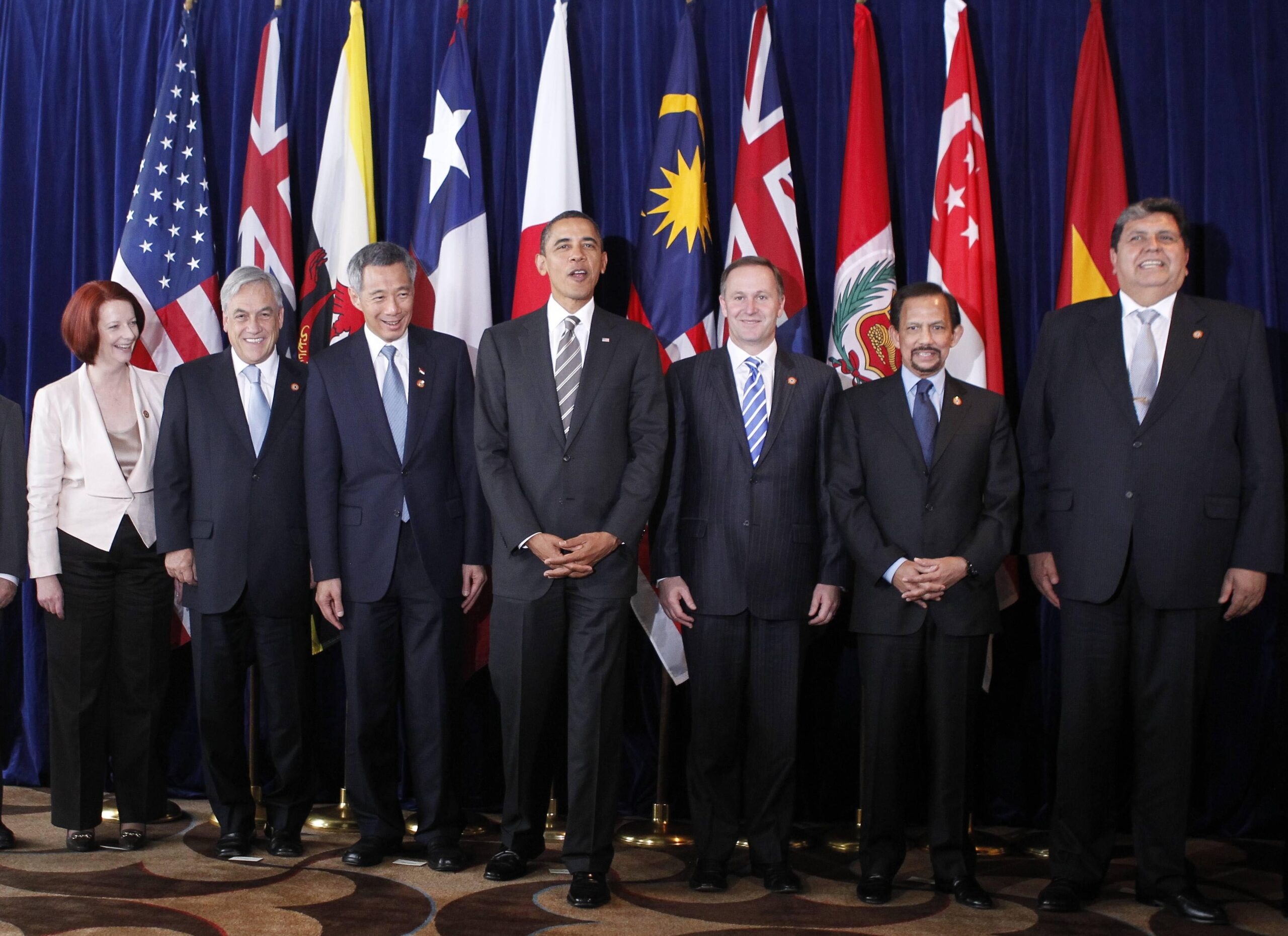President Barack Obama, center, takes part in the Trans-Pacific Partnership meeting at the APEC summit in Yokohama,  Sunday, Nov. 14, 2010. Pictured left to right: Prime Minister Naoto Kan of Japan, Vietnamese President Nguyen Minh Triet, Prime Minister Julia Gillard of Australia, Chilean President Sebastian Pinera, Prime Minister Lee Hsien Loong of Singapore, President Obama, Prime Minister John Key of New Zealand, Sultan Hassanal Bolkiah of Brunei, President Alan Garcia of Peru, Malaysian Deputy Prime Minister Muhyiddin Yassin.(AP Photo/Charles Dharapak) (Charles Dharapak)