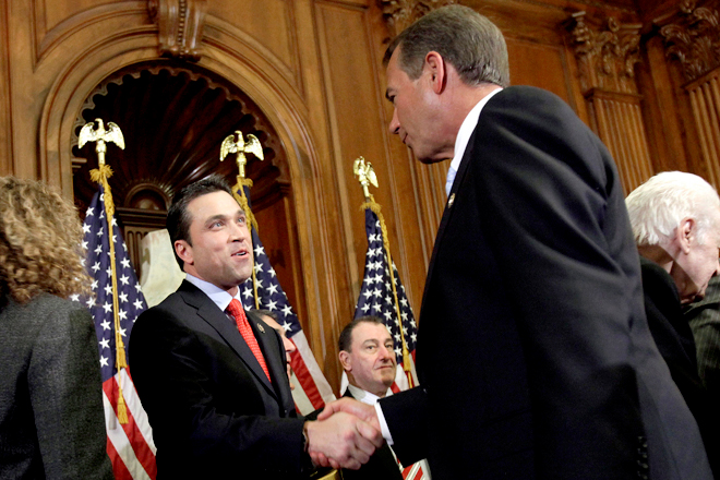 House Speaker John Boehner of Ohio, right, participates in a ceremonial House swearing-in ceremony for Rep. Michael Grimm, R-N.Y., on Capitol Hill in Washington, Wednesday, Jan. 5, 2011. (AP/Jacquelyn Martin)