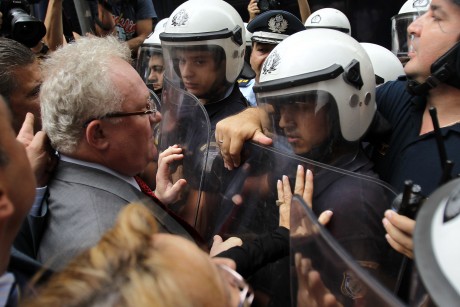Riot cops and strikers square of in Athens Wednesday (AP Photo)