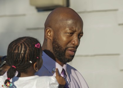 Tracy Martin, Trayvon's father, marches for his son in a March rally in Florida (Shutterstock)