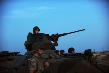 Turkish soldiers stand guard in Akcakale by the Turkish-Syria border. (Bulent Kilic/AFP/Getty Images)