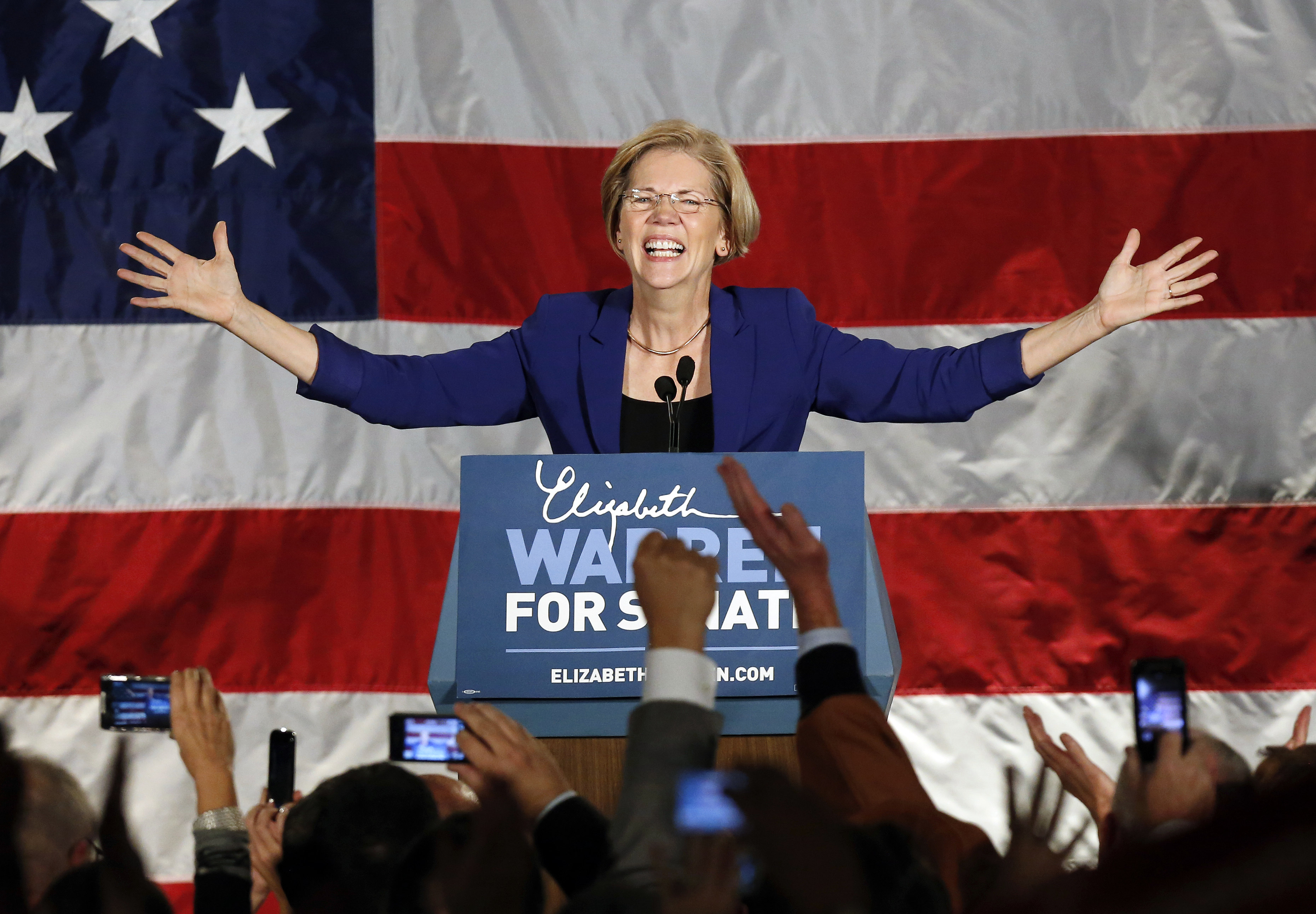 Democrat Elizabeth Warren takes the stage after defeating incumbent GOP Sen. Scott Brown in the Massachusetts Senate race. (AP/Michael Dwyer)