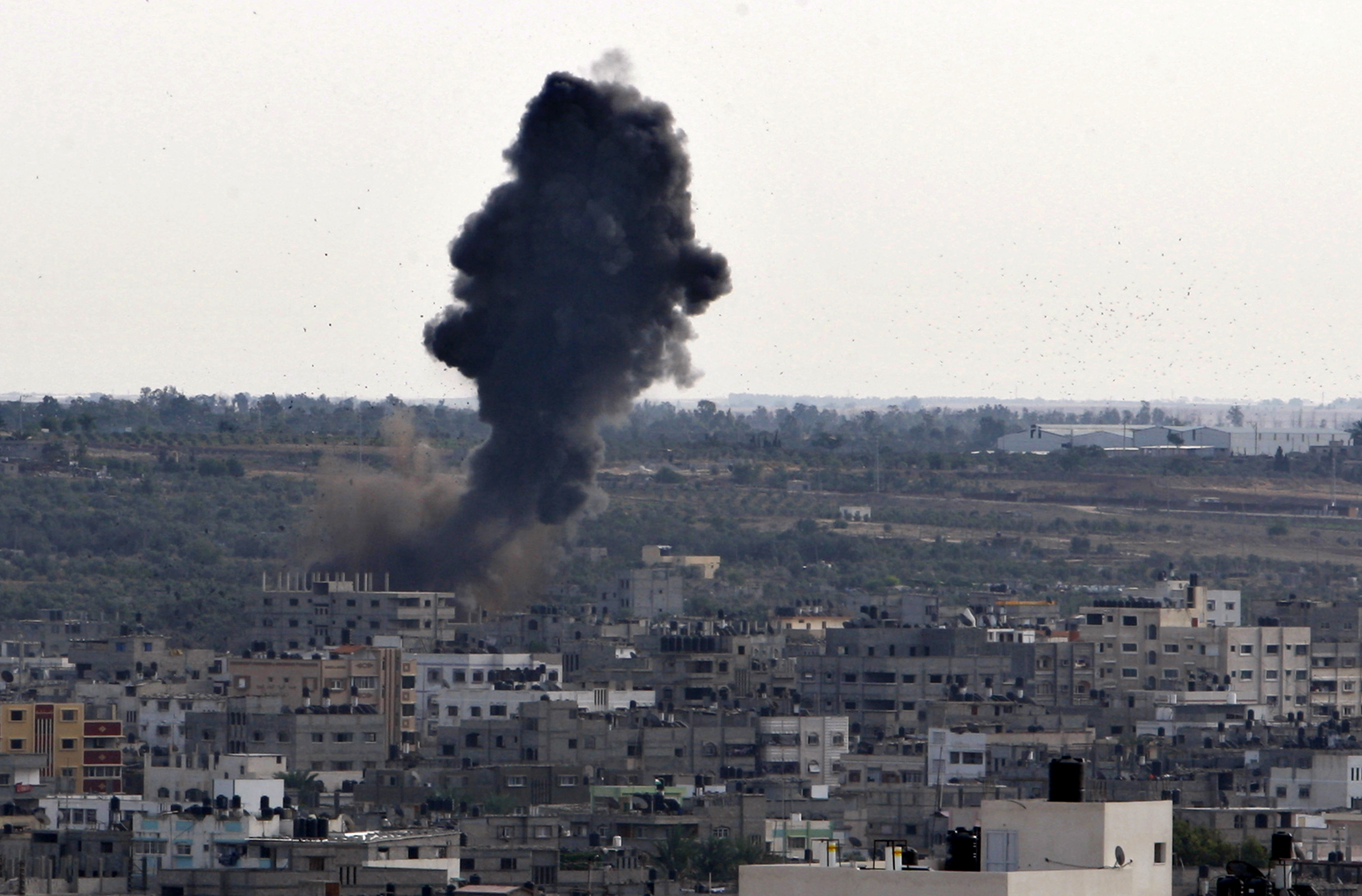 Smoke rises following an Israeli attack in Gaza City. (AP/Adel Hana)
