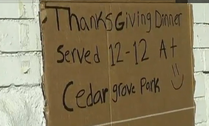 Victims of Sandy on Staten Island share a community meal (screenshot from Reuters video)