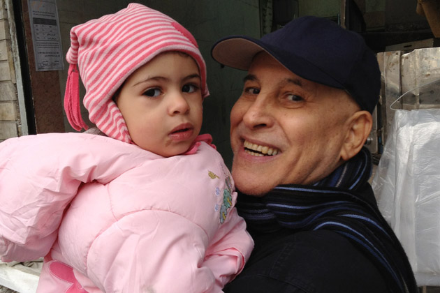 Dr. Rahmatollah Sedigh Sarvestani, pictured with his granddaughter Fatimah, is dying in Iran, but the U.S. has denied his visa request. (Courtesy of the Sarvestani Family)