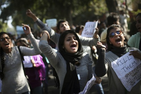 Indian students shout slogans as they march a street during a protest in New Delhi, India. (AP/Altaf Qadri)