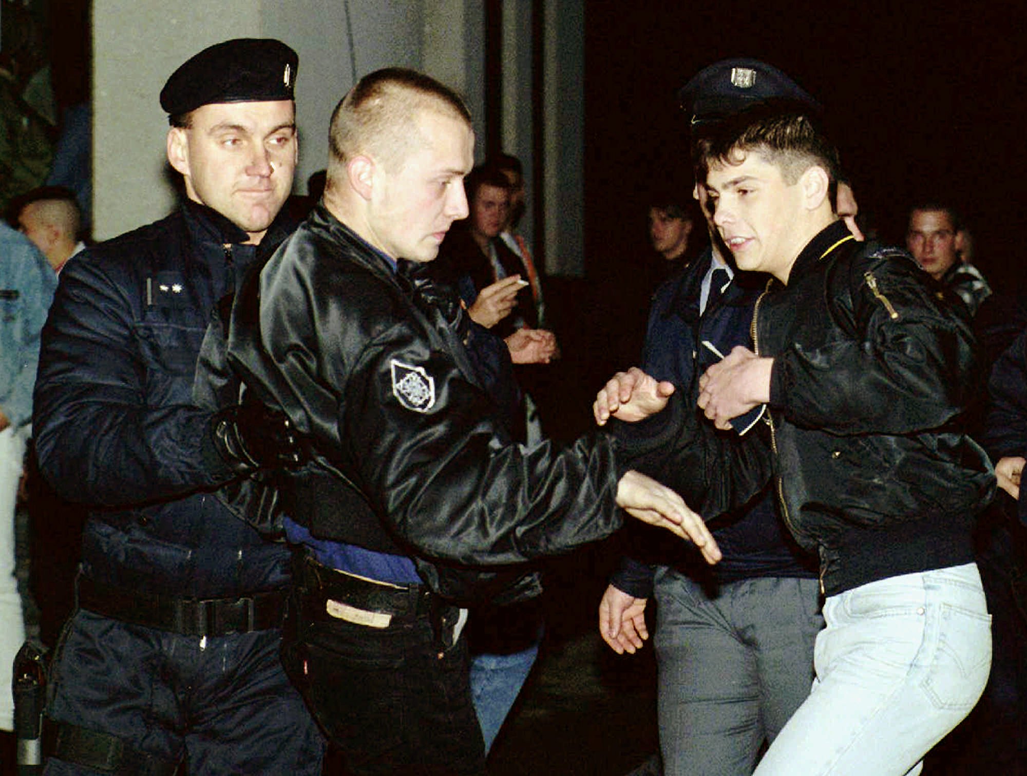 Czech riot policemen clash with drunken skinheads in Kozolupy, some 100 kilometres southwest of Prague. (AP/Jiri Bervida)