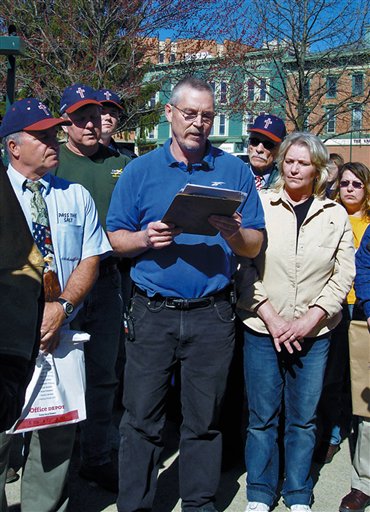 FILE - In this April 16, 2008 file photo, John Freshwater, center, addresses a crowd on Mount Vernon's public square in Mount Vernon, Ohio. The Ohio Supreme Court is ready to hear arguments in the case of Freshwater, a fired public school science teacher who kept a bible on his desk and was accused of preaching religious beliefs in class. (AP Photo/Mount Vernon News, Pam Schehl, File) (AP)
