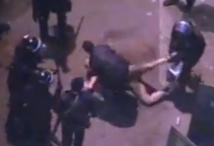 Screenshot from ONTV appears to show Morsi's police beating Hamada Saber, 50 (Twitter)