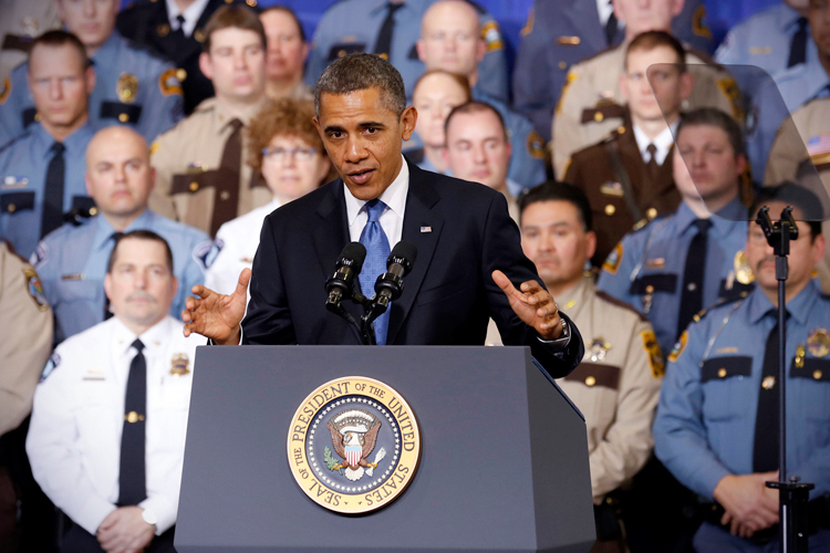 Barack Obama speaks about ways to reduce gun violence during a visit to the Minneapolis Police Department Special Operations Center in Minneapolis on Feb. 4, 2013. (Reuters/Kevin Lamarque)