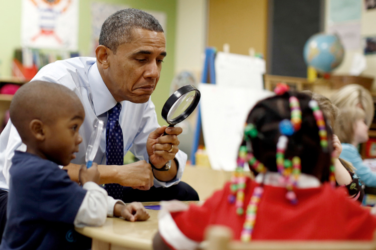 Barack Obama with children in a pre-kindergarten classroom at College Heights early childhood learning center in Decatur February 14, 2013. (Reuters/Jason Reed)