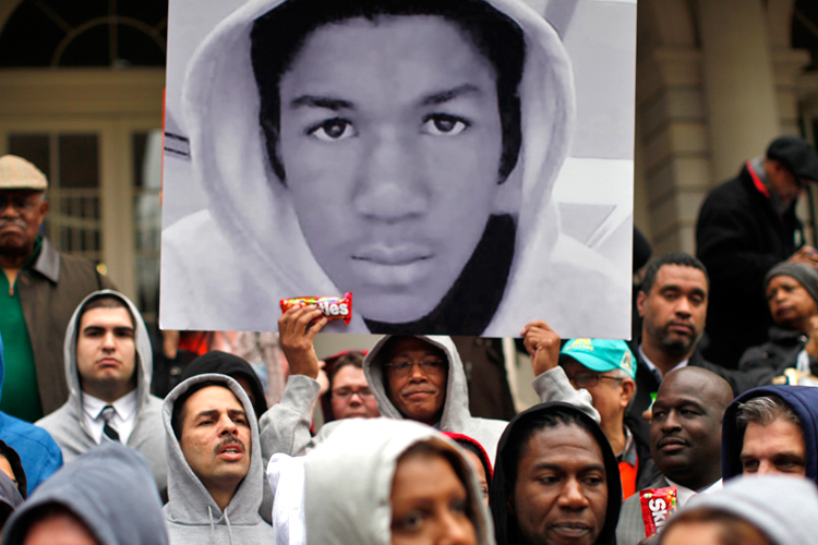 Members of the New York City Council stand together on the steps of City Hall in New York, March 28, 2012 during a news conference to call for justice in the February 26 killing of Trayvon Martin in Sanford, Florida. (Reuters/Mike Segar)