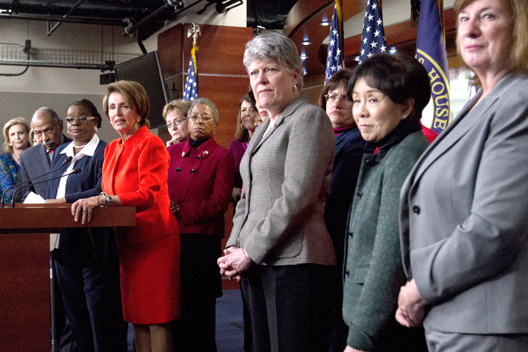 House Minority Leader Nancy Pelosi of Calif., center, accompanied by fellow House Democrats, leads a news conference on Capitol Hill in Washington, Wednesday, Jan. 23, 2013, to discuss the  reintroduction of the Violence Against Women Act. (AP/Jacquelyn Martin)