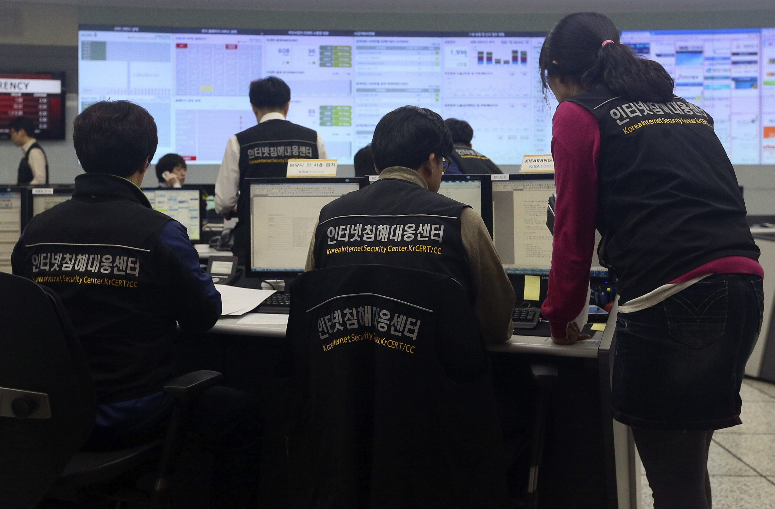 Employees of Korea Internet Security Center work after computer networks at two major South Korean banks and three top TV broadcasters war paralyzed at a monitoring room in Seoul, South Korea, Wednesday, March 20, 2013. (AP/Yonhap, Han Jong-chan)