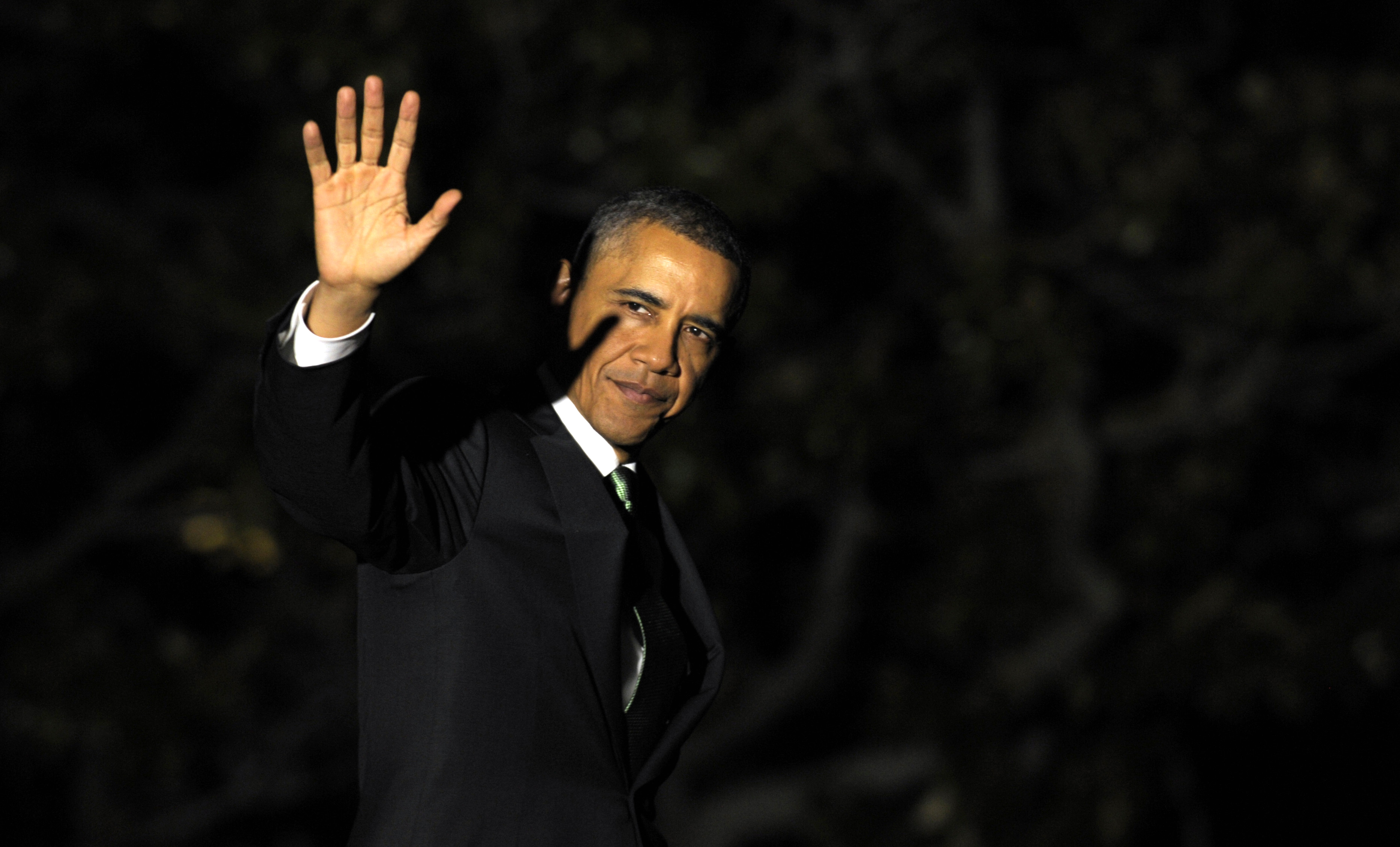 President Barack Obama waves as he walks to Marine One on the South Lawn of the White House in Washington, Tuesday, March 19, 2013. (AP/Susan Walsh)