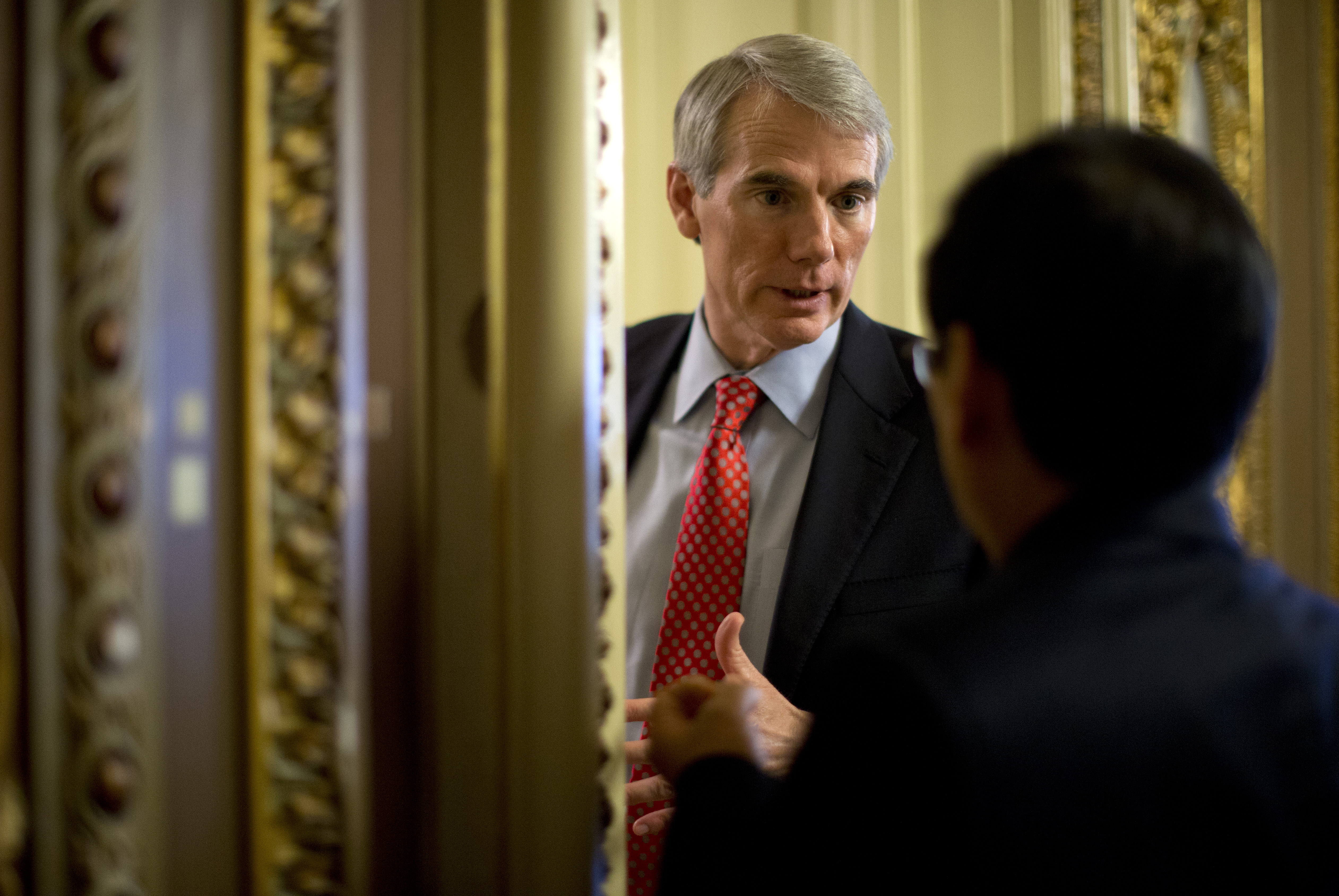 Sen. Rob Portman, R-Ohio. pauses to talk on Capitol Hill in Washington, Tuesday, Feb. 26, 2013, after the weekly Republican policy luncheon. (AP/Carolyn Kaster)