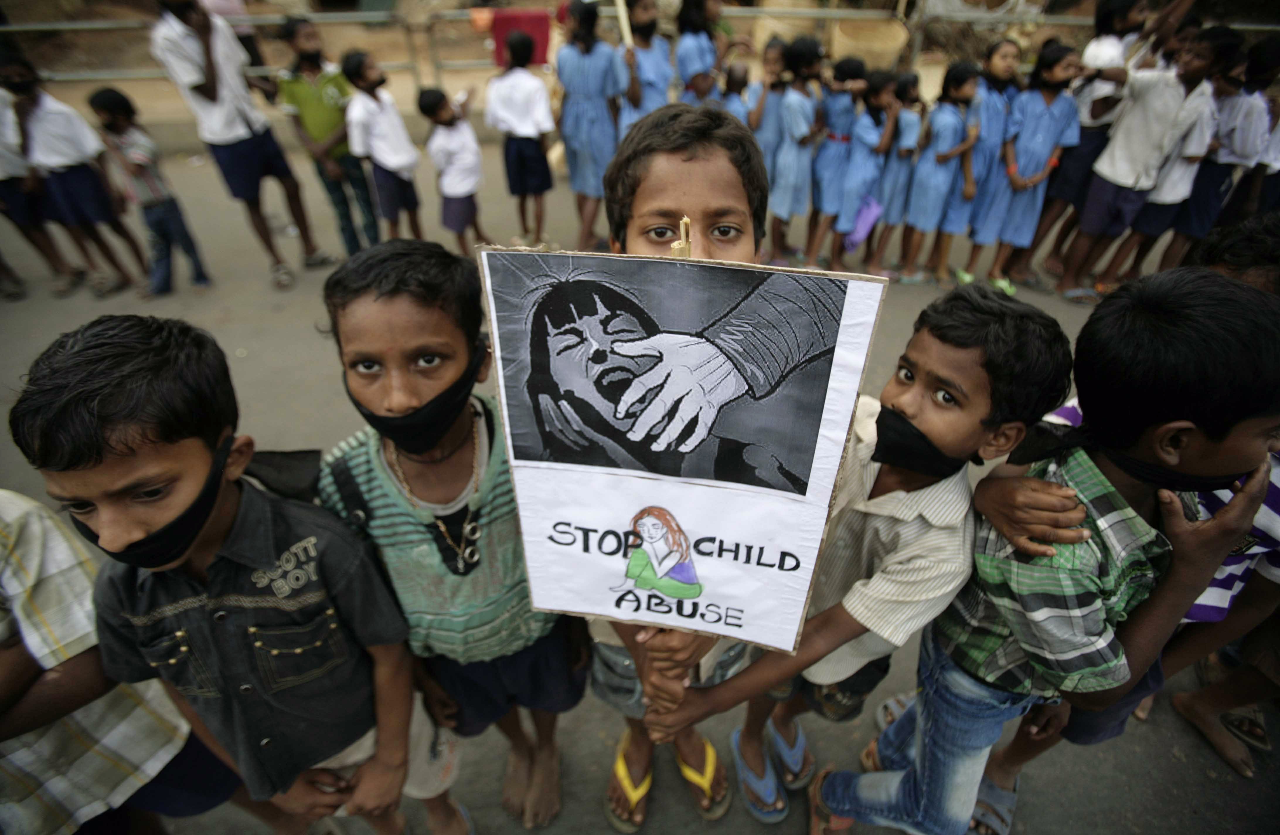 Indian children participate in a protest against child abuse and rising crimes against women, in Bhubaneswar, India, Saturday, March 16, 2013. (AP/Biswaranjan Rout)