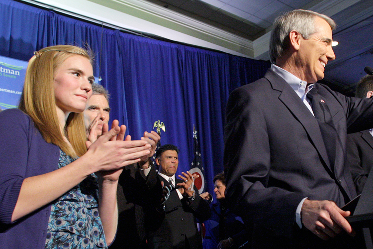 Rob Portman and his daughter Sally at the Ohio Republican Party celebration Nov. 2, 2010, in Columbus, Ohio. (AP/Jay Laprete)