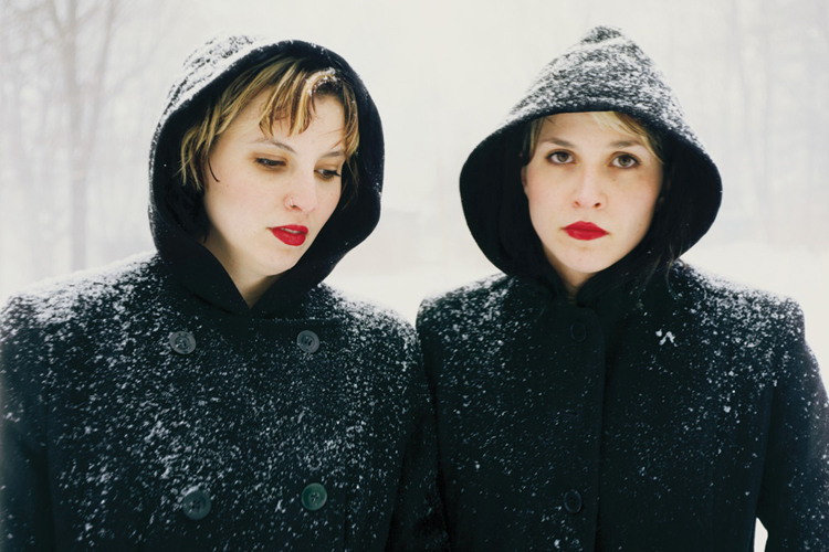 A photo of the author, right, with her twin sister, Cara.