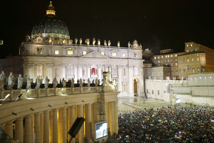 White smoke billows from the chimney on the Sistine Chapel indicating that a new pope has been elected in St. Peter's Square at the Vatican, Wednesday, March 13, 2013. (AP/Andrew Medichini)