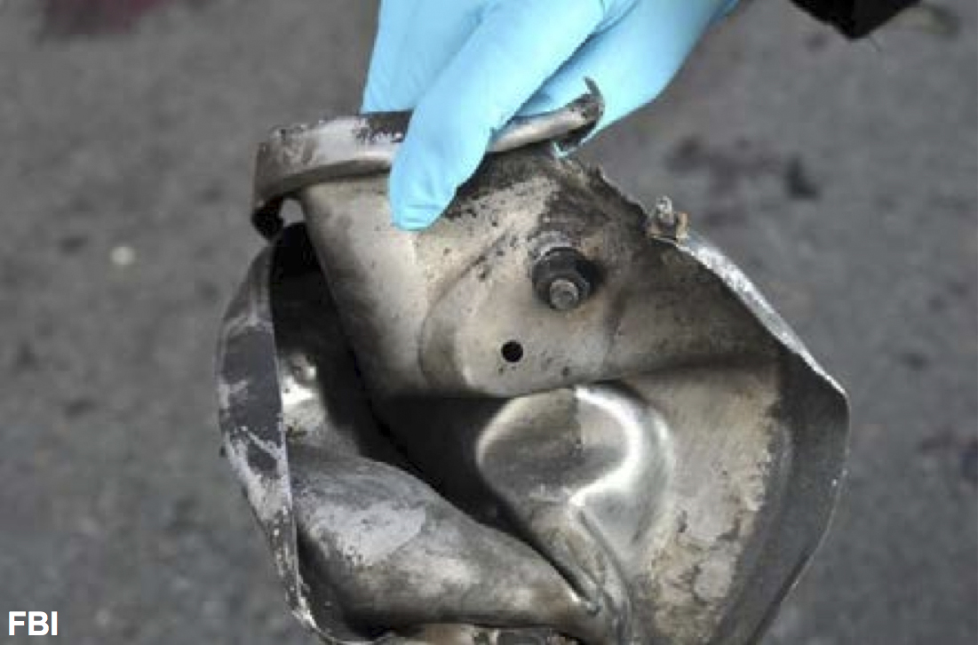 The remains of a pressure cooker that the FBI says was part of one of the bombs that exploded during the Boston Marathon. (Associated Press)