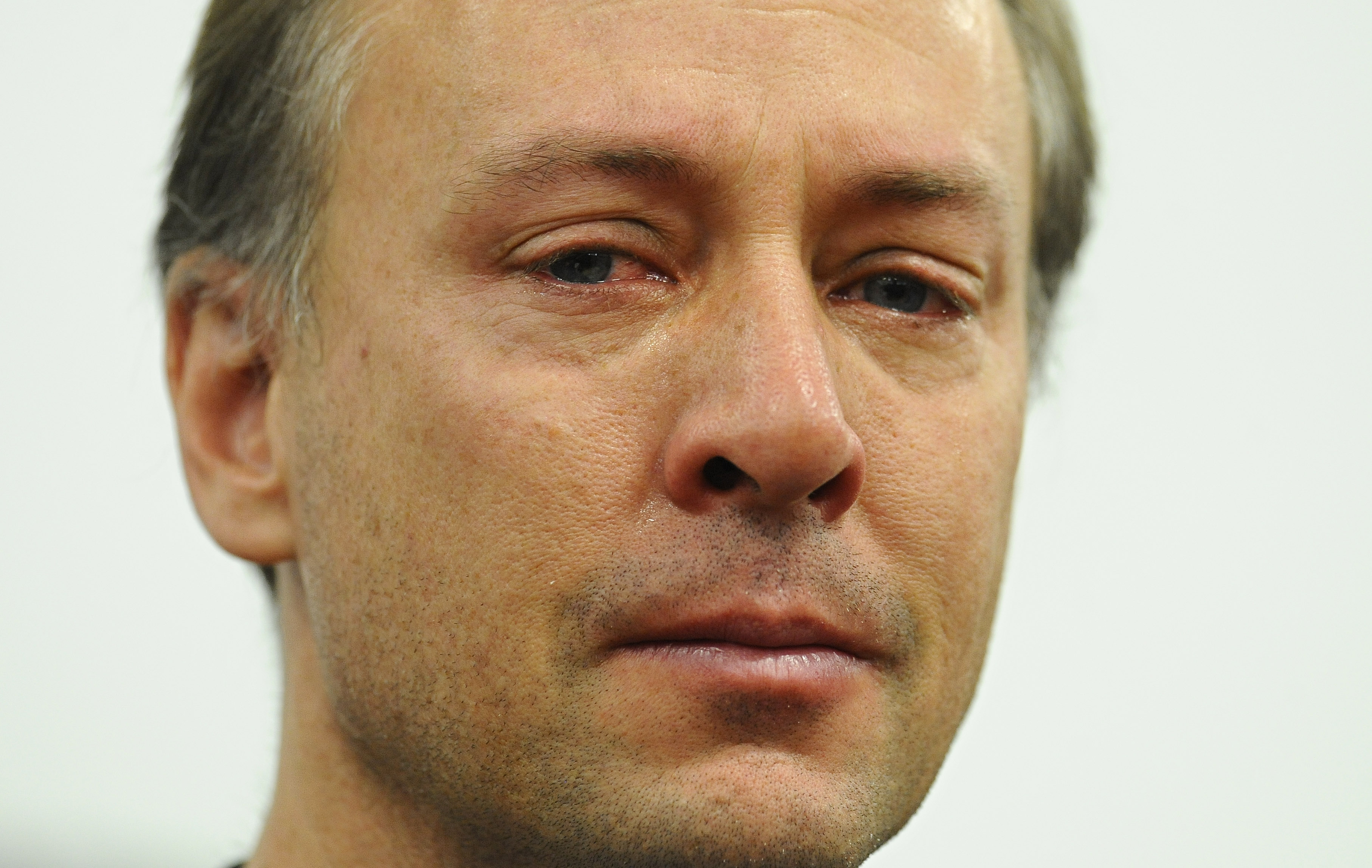 Mark Barden, father of Sandy Hook shooting victim Daniel Barden, listens at news conference at Edmond Town Hall in Newtown, Conn., Monday, Jan. 14, 2013. (AP/Jessica Hill)