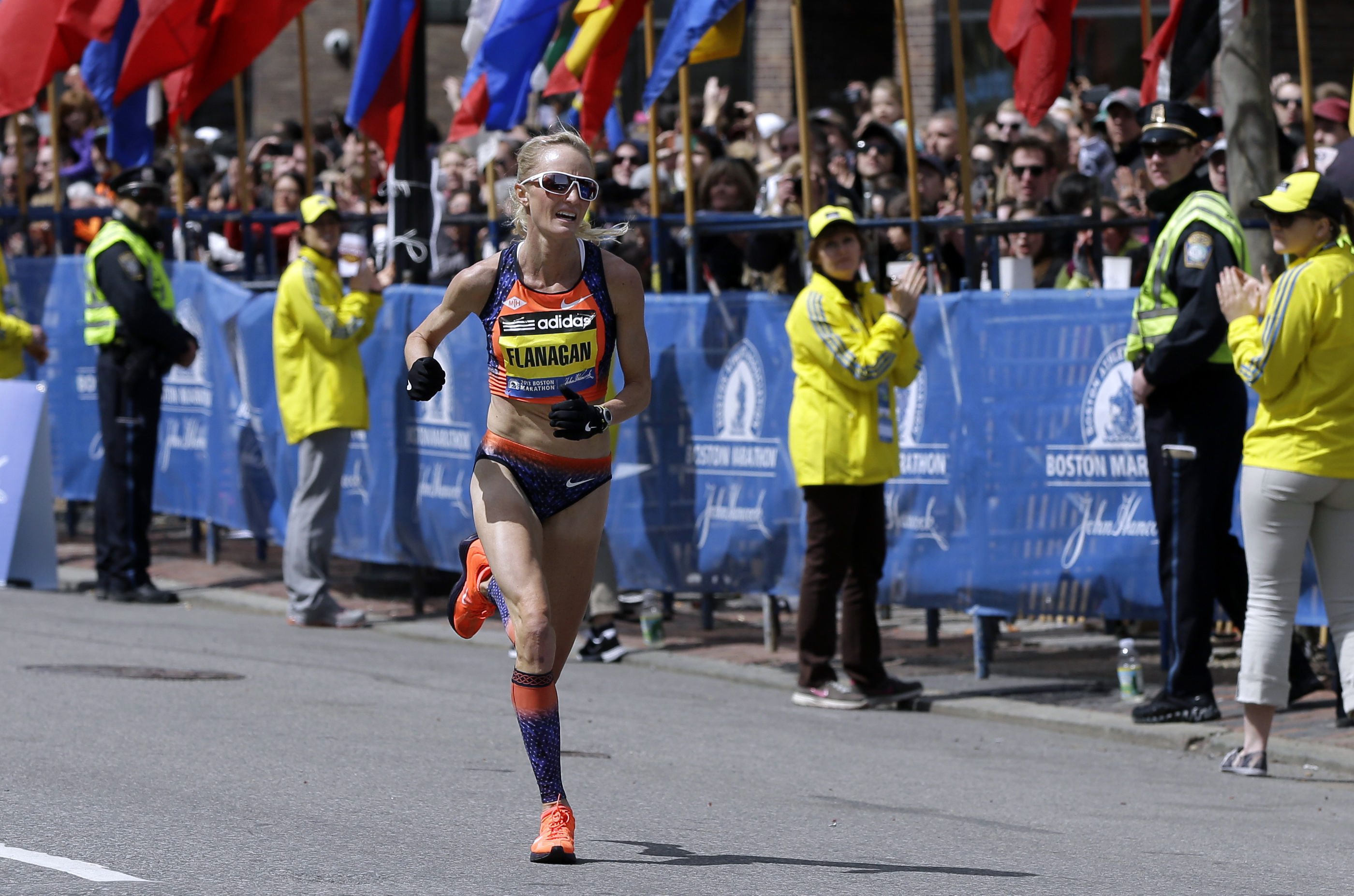 Shalane Flanagan approaches the finish line to finish fourth in the women's division of the 2013 Boston Marathon in Boston Monday, April 15, 2013. (AP/Elise Amendola)