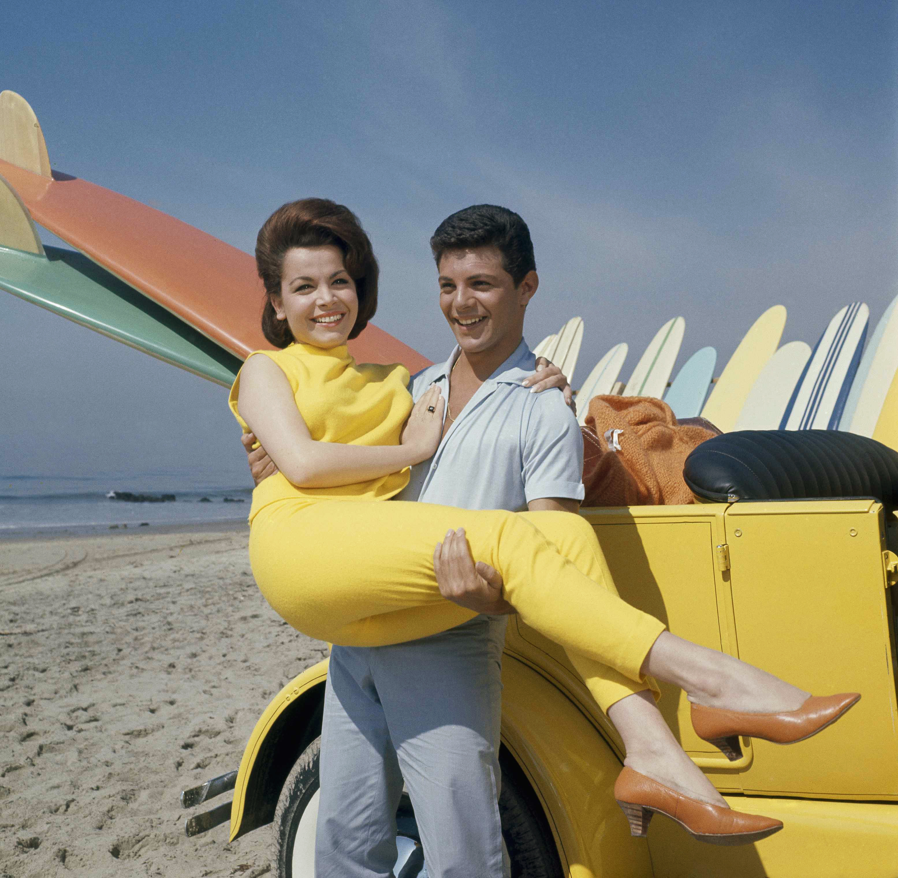 Frankie Avalon and Annette Funicello are seen on Malibu Beach during filming of "Beach Party," in California in 1963. (AP/File)