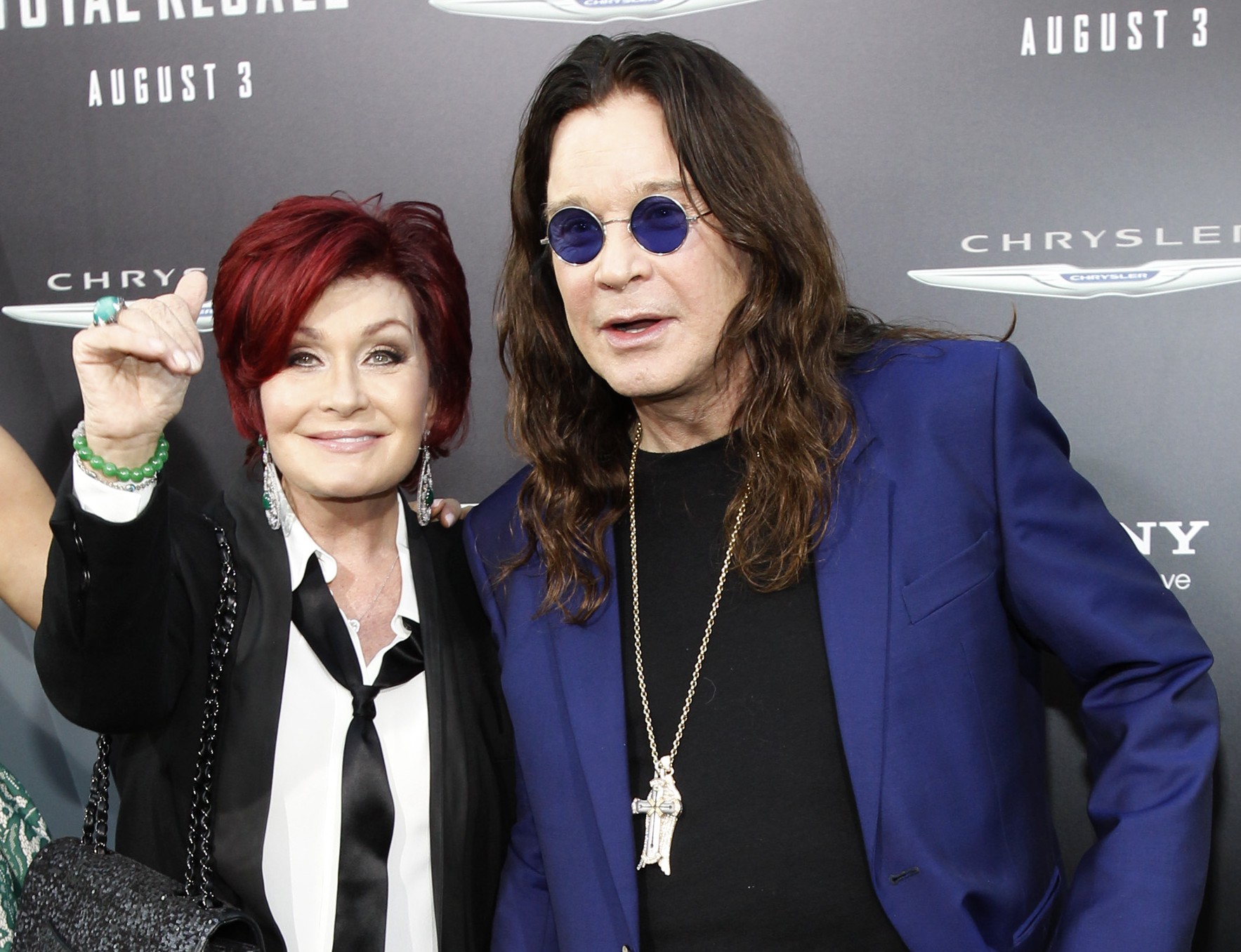 Ozzy Osbourne and his wife Sharon pose at the premiere of "Total Recall" at the Grauman's Chinese theatre in Hollywood, California August 1, 2012. The movie opens in the U.S. on August 3. REUTERS/Mario Anzuoni (UNITED STATES - Tags: ENTERTAINMENT) - RTR35W70 (Reuters)