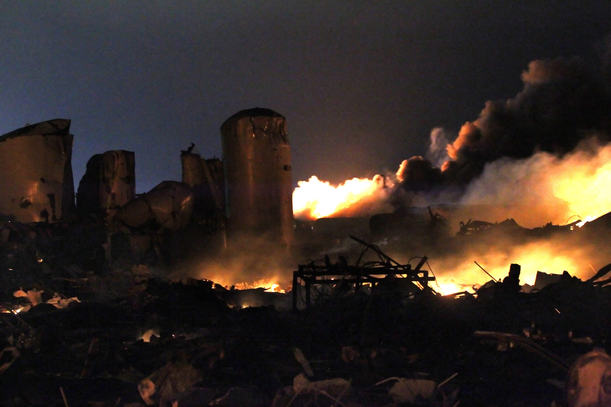 The remains of a fertilizer plant burn after an explosion at the plant in the town of West, near Waco, Texas early April 18, 2013. (Reuters)