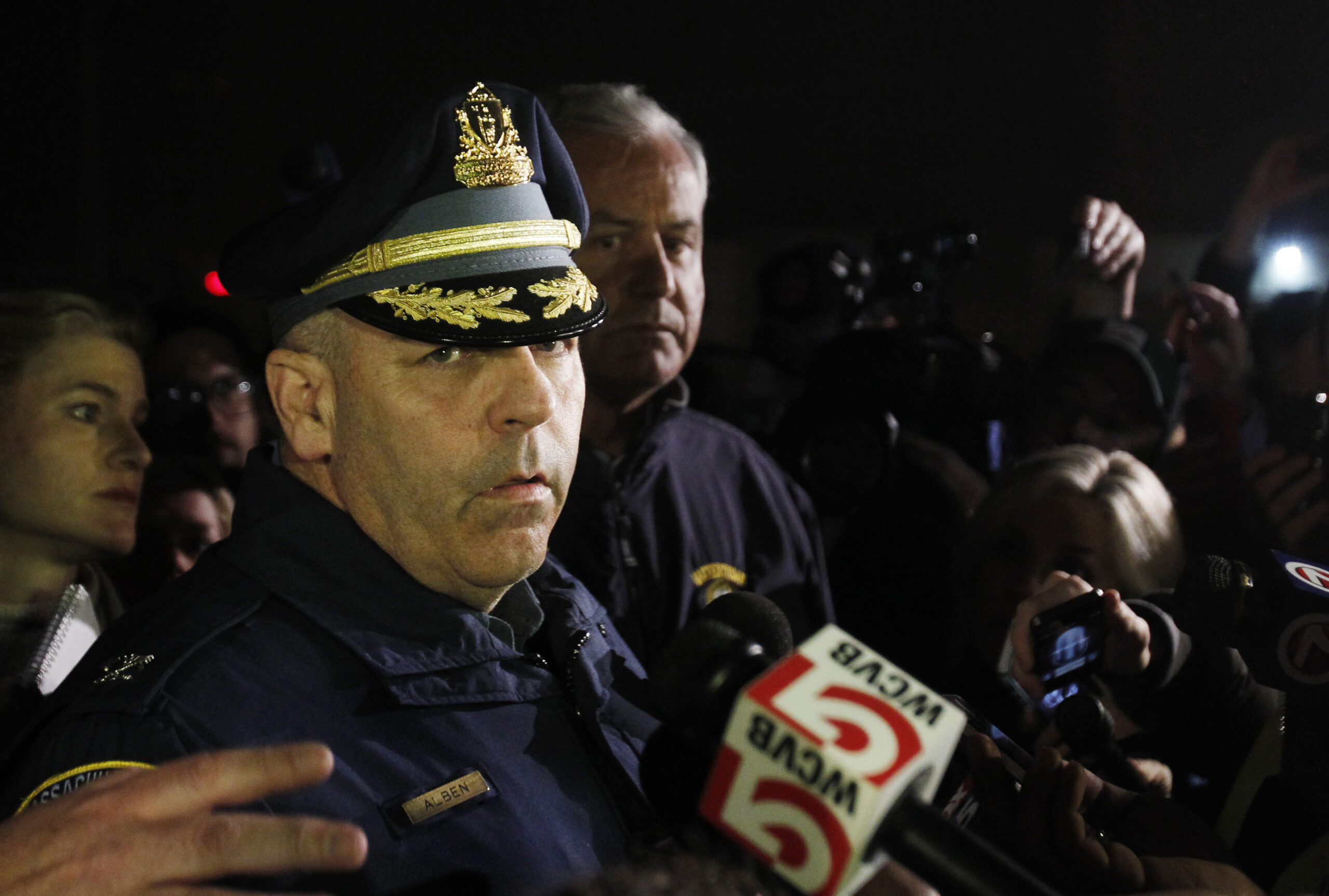 Superintendent and Colonel of the Massachusetts State Police Timothy P. Alben speaks to reporters about the status of the two suspects in the Boston Marathon bombings in Watertown, Massachusetts April 19, 2013. Massachusetts State Police warned people in the Boston suburb of Watertown not to open their doors and said they would conduct a door-to-door, street-by-street search due to what it called a fluid situation. REUTERS/Jessica Rinaldi (UNITED STATES - Tags: CIVIL UNREST CRIME LAW SPORT ATHLETICS) - RTXYRV9 (Reuters)
