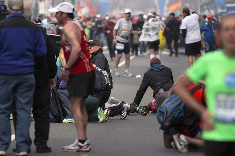 People react to an explosion at the 2013 Boston Marathon in Boston, Monday, April 15, 2013. (AP/The Daily Free Press/Kenshin Okubo)