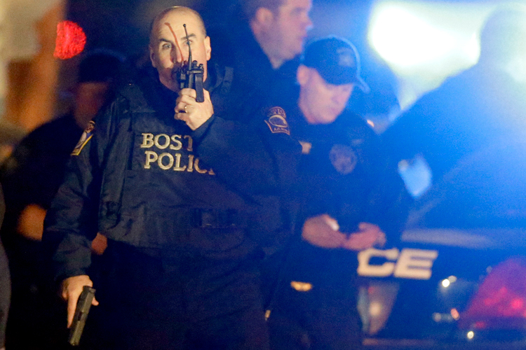Police officers work a crime scene Friday, April 19, 2013, in Watertown, Mass. (AP/Matt Rourke)