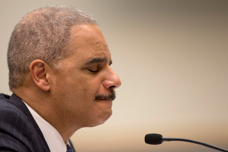 Attorney General Eric Holder pauses as he testifies on Capitol Hill (Carolyn Kaster)