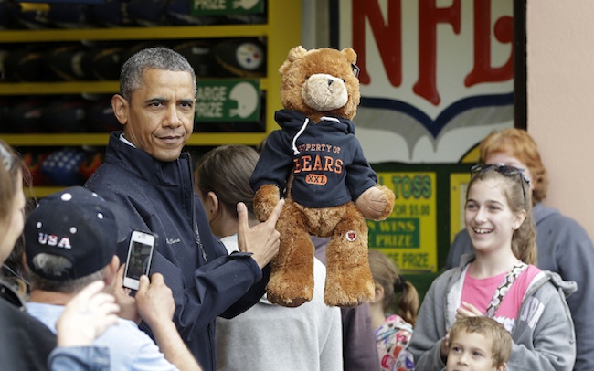 New Jersey Gov. Chris Christie wins President Obama a Chicago (teddy) bear on the Jersey Shore, Tuesday. At least it wasn't wearing a fleece. (AP/Pablo Martinez Monsivais)