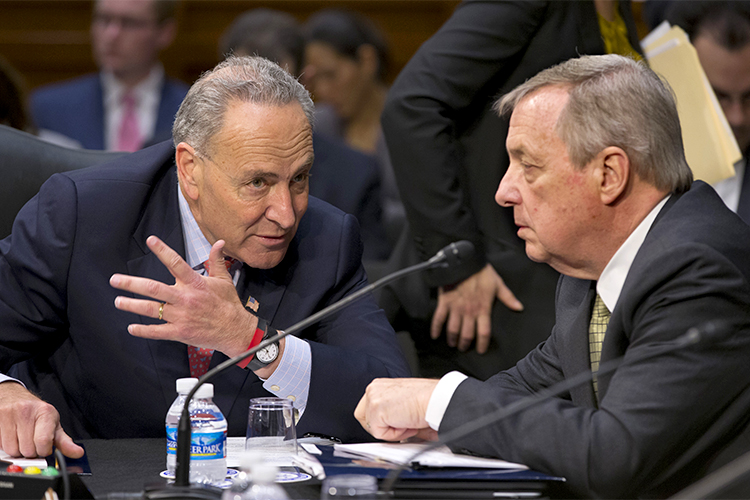 Sen. Chuck Schumer, D-N.Y., Sen. Richard Durbin, D-Ill. confer on Capitol Hill in Washington, Monday, May 20, 2013. (AP/J. Scott Applewhite)