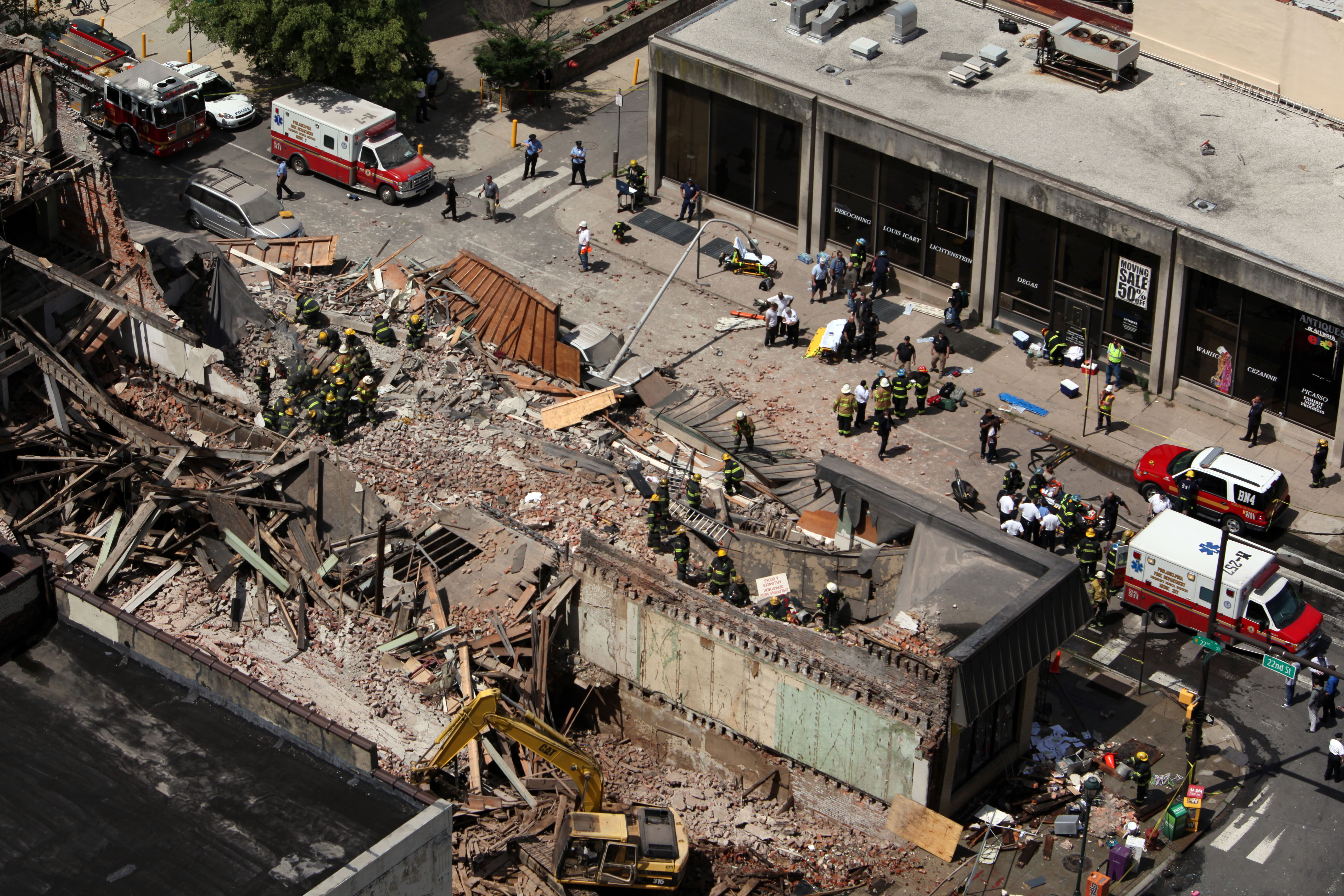 Rescue personnel work the scene of a building collapse in downtown Philadelphia, Wednesday, June 5, 2013. (AP/Jacqueline Larma)