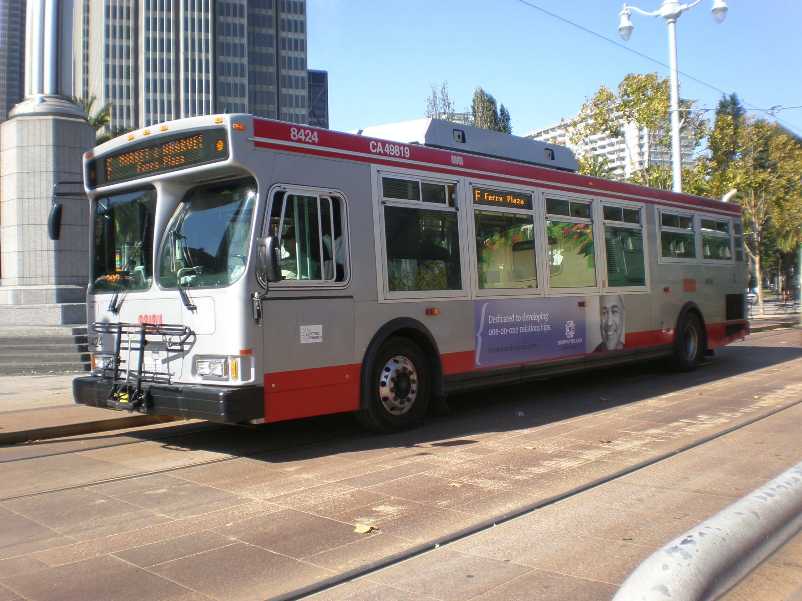 A Muni bus operating on the tracks of the F Market & Wharves to handle extra passenger loads during Fleet Week. (Wikimedia Commons)