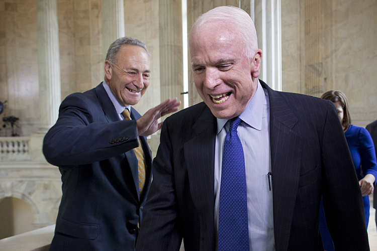 Senators John McCain, R-Ariz., Chuck Schumer, D-N.Y. (AP/J. Scott Applewhite)