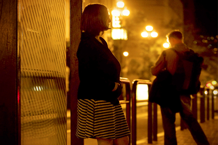 A worker in prostitution who goes by the name "Violet," in downtown San Francisco. (AP/Darryl Bush)